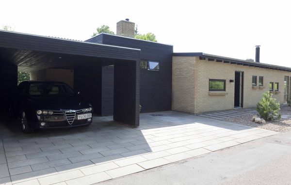 Carport integreret med huset