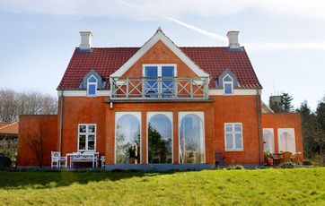 Hus hvor facaden er blevet pudset og har fået en overfladebehandling