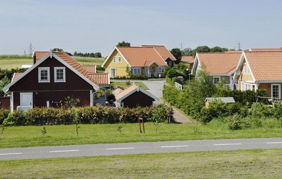 Beskatning af ejerboliger (ejendomsværdiskat og grundskyld)
