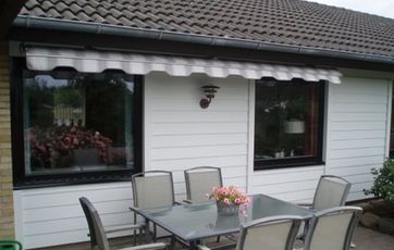 Let facade og nye vinduer.