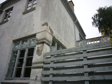 Frostskade i pudset facade