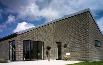 Lavenergihus klasse 2 i grå mursten