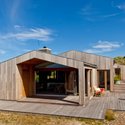 Sommerhus: Hus og landskab i skøn harmoni