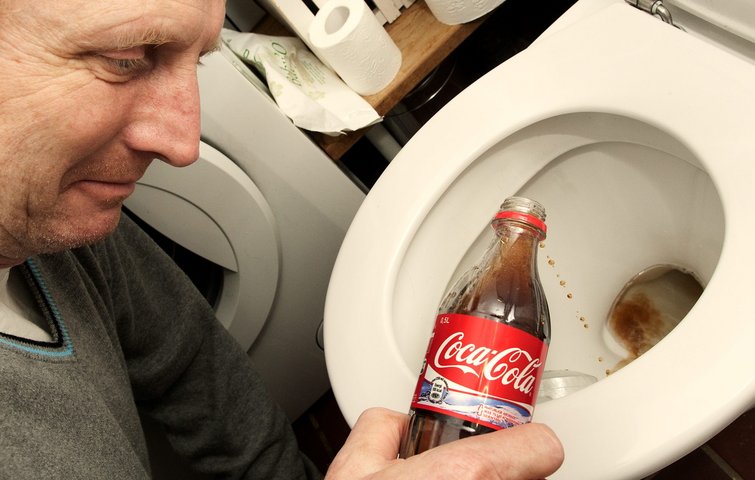 lade have tillid Pilgrim Kan cola fjerne rust i toilettet?